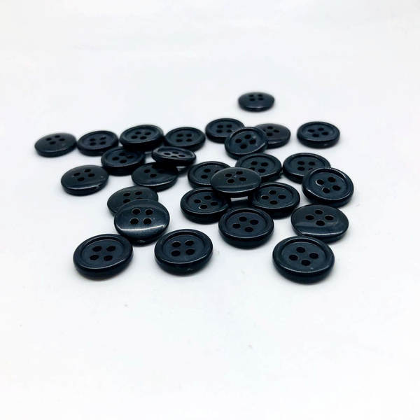 Botão do fabricante botão de resina preto branco quatro olhos largos botão de pão fino borda polo camisa botão de roupa