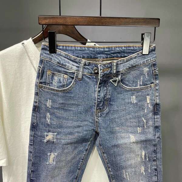Nove pênis jeans meninas roxo calças coreanas tendências recém-nascidos personalidade elástica rasgar mendigo calças explodir