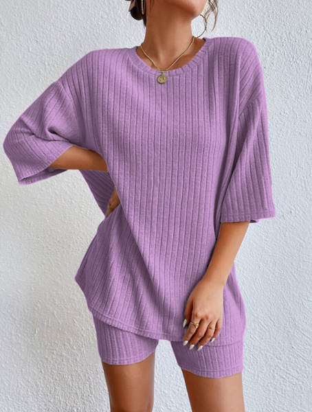 Novo modelo europeu-americano de moda de lazer de 2026, cor pura da primavera, colar redondo, roupas femininas de calça curta