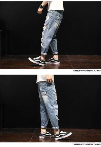 Calça jeans rasgada larga masculina