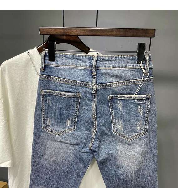 Nove pênis jeans meninas roxo calças coreanas tendências recém-nascidos personalidade elástica rasgar mendigo calças explodir