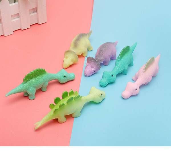 Tiro de dinossauro brinquedos divertidos de dedos de tiro de dedos de lançamento de pequenos dinossauros de despressão de softgels transfronteiriços Novas fontes de atacado