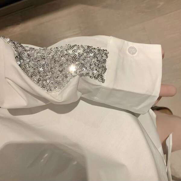 Blusa com detalhes em purpurina