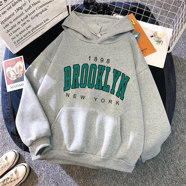 Vestido de inverno brilhante de Brooklyn com chapéus e camisas de esportes