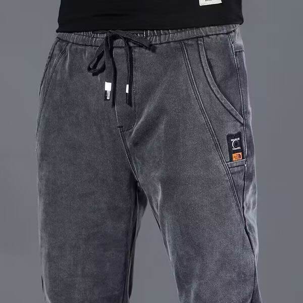 Calça jeans elástica masculina