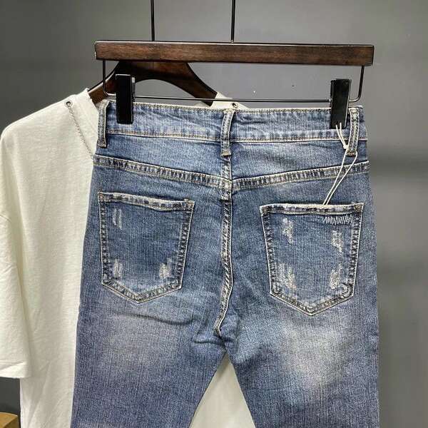 Nove pênis jeans meninas roxo calças coreanas tendências recém-nascidos personalidade elástica rasgar mendigo calças explodir