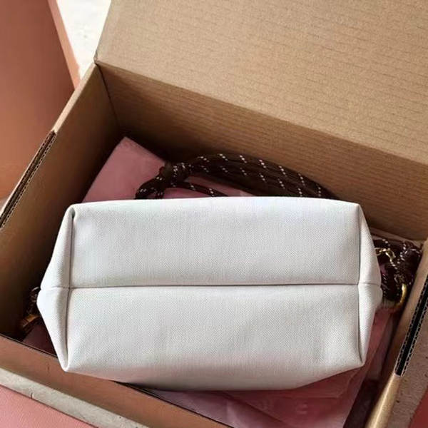 Miu Mu2025 novo colisão cor-de-cabeça de surf veludo de repouso em uma caixa de refeições de moda de ombros solitários