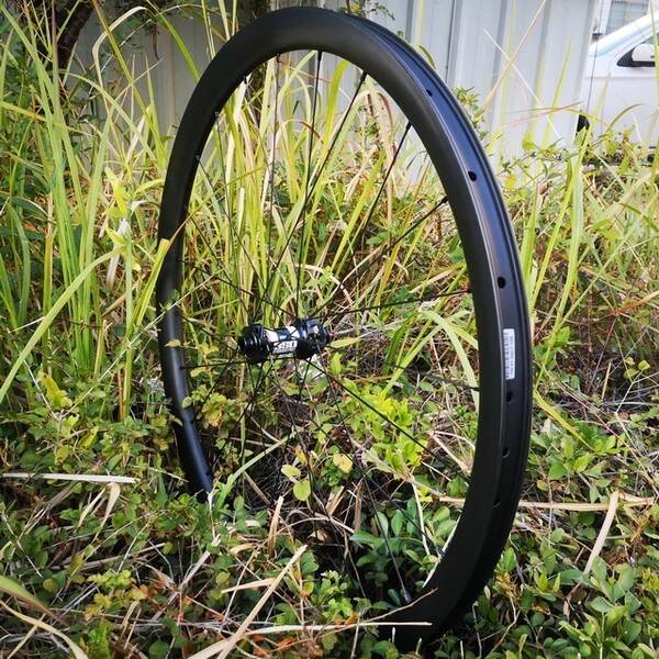 700C bicicleta de areia carvão 31mm de largura 34mm de alto vácuo placa de travagem leve versão oriental TorayT700+T800