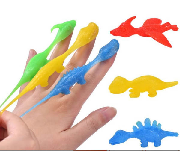 Tiro de dinossauro brinquedos divertidos de dedos de tiro de dedos de lançamento de pequenos dinossauros de despressão de softgels transfronteiriços Novas fontes de atacado