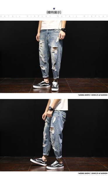 Calça jeans rasgada larga masculina