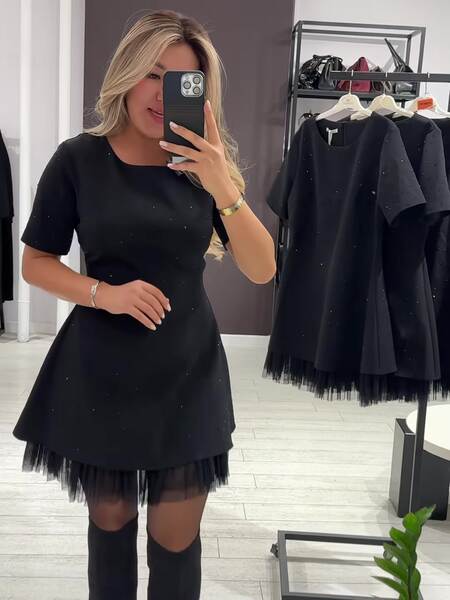O novo vestido da Amazon para o ano de 2026 é um casaco curto.