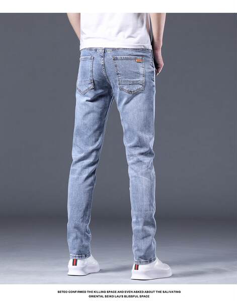 2025 Novo jeans masculino verão coreano coroado Pequenas pernas Longas calças masculinas elegantes calças de descanso flexíveis