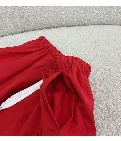 No verão, a nova versão de alta qualidade do óleo do sul com a letra mmu é estampada com uma corda fina e meio-cortinha.