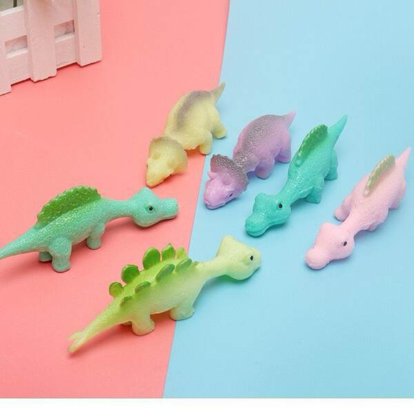 Tiro de dinossauro brinquedos divertidos de dedos de tiro de dedos de lançamento de pequenos dinossauros de despressão de softgels transfronteiriços Novas fontes de atacado