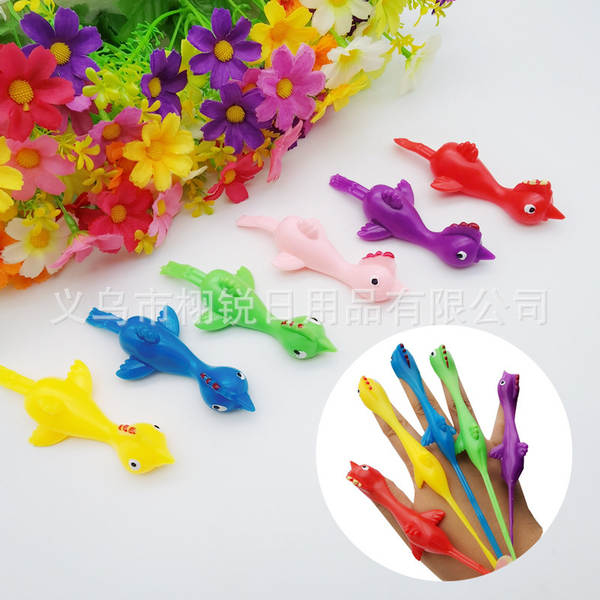 Tiro de dinossauro brinquedos divertidos de dedos de tiro de dedos de lançamento de pequenos dinossauros de despressão de softgels transfronteiriços Novas fontes de atacado