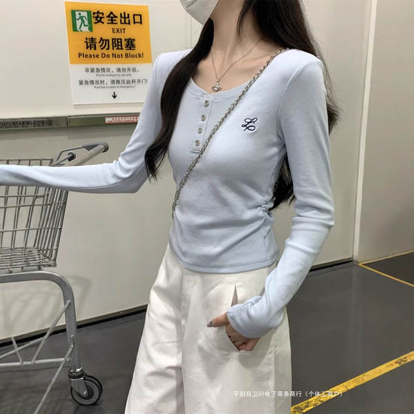 Camisa longa de manga com botão em azul claro