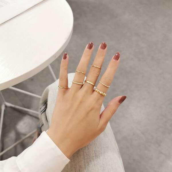 Anel de vestido de estudante coreano coreano simples de cor vermelha feminino personalidade frio e frio 8 peças de anel de vestido de aprendizagem