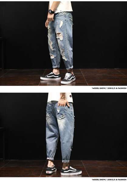 Calça jeans rasgada larga masculina