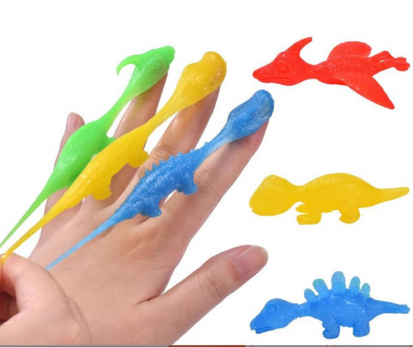 Tiro de dinossauro brinquedos divertidos de dedos de tiro de dedos de lançamento de pequenos dinossauros de despressão de softgels transfronteiriços Novas fontes de atacado