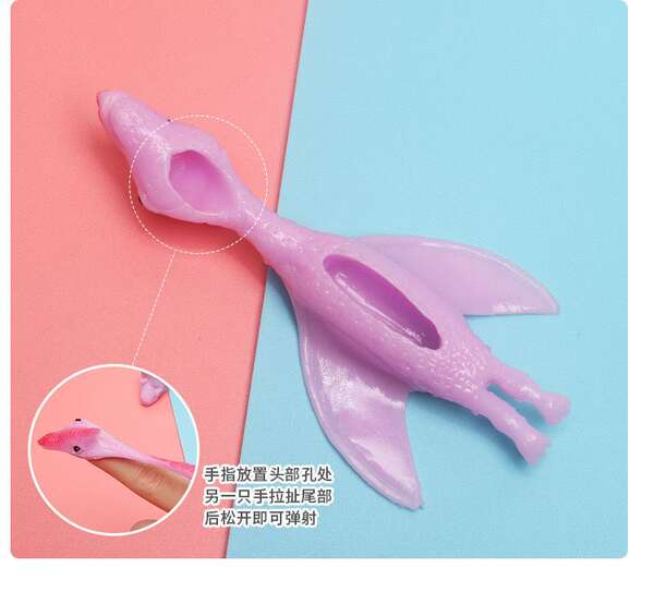 Tiro de dinossauro brinquedos divertidos de dedos de tiro de dedos de lançamento de pequenos dinossauros de despressão de softgels transfronteiriços Novas fontes de atacado