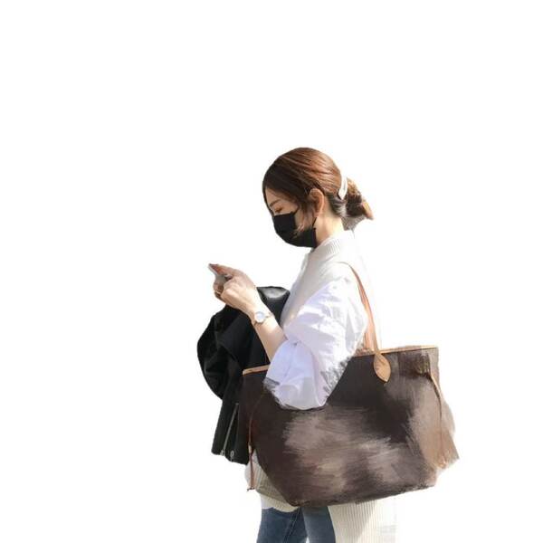 Fabricação de bolsas de couro real 2025 nova bolsa de compras clássica de moda de grande capacidade de bolsa de mamãe de ombro único