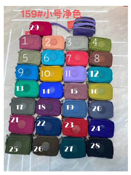 Fabricantes vendem diretamente carteiras de varejo de comércio estrangeiro Cadeiras transfronteiriças simples chave impermeável bolsa de nylon cadeia de varejo carteira de varejo