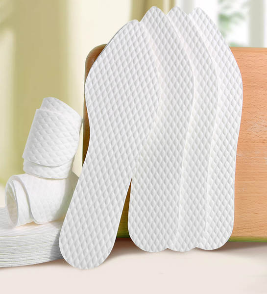 Inserção de calçado absorvente descartável